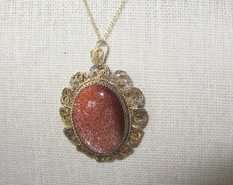 Vintage 800 Silver Oval Goldstone Scroll Filigree Pendant Brooch