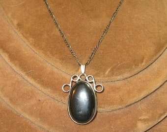 Hematite pendant on a long Sterling chain Necklace: 30" long Chain