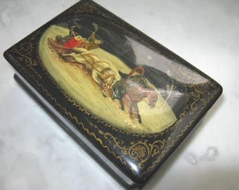 Vintage Russian lacquer box with beautifully painted troika winter scene on the lid.