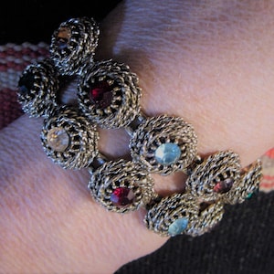 Stunning signed Judy Lee multi color Rhinestone and &quot;antiqued&quot; Gold Tone Wide Panel Bracelet