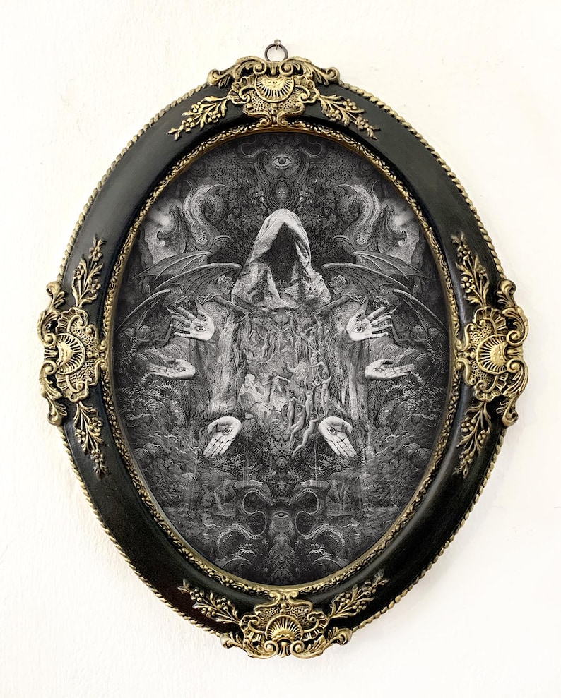 May include: An oval wall art piece featuring a black and white intricate illustration of a hooded figure with wings and multiple hands, each displaying an eye on the palm. The artwork is encased in a black frame with ornate gold-colored metal accents.