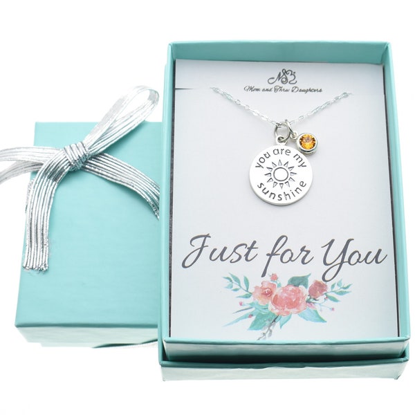 Little Girl's sterling silver you are my sunshine necklace personalized with birthstone crystal on a sterling silver cable chain.