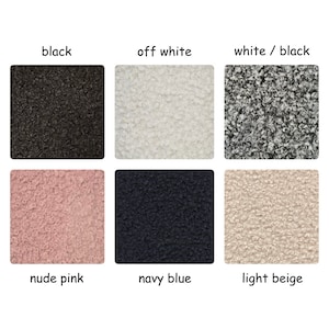 May include: Six fabric swatches in different colors and textures. The swatches are arranged in two rows of three. The colors are black, off white, white/black, nude pink, navy blue, and light beige.