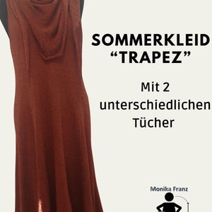 Puede incluir: Un vestido de punto marrón con un escote drapeado y una falda amplia y fluida. El vestido se llama "Trapez" y está diseñado para ser usado con dos bufandas diferentes. El texto "Stricklabor" está en la esquina superior derecha de la imagen.