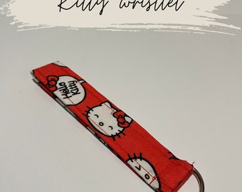 Red hello kitty Sanrio print wristlet keychain