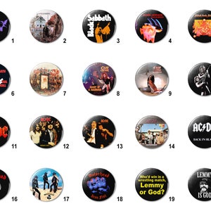 May include: A collection of 20 round metal pinback buttons featuring various rock band logos and album art. Bands include Black Sabbath, AC/DC, and Motörhead. The buttons are black with colorful graphics and text.