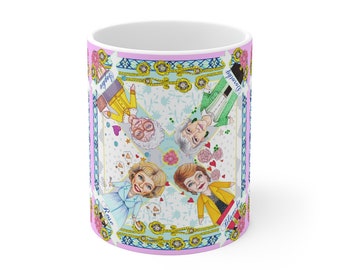 May include: White ceramic mug featuring a colorful illustration of four women in a decorative frame. The names "Sophia", "Dorothy", "Rose", and "Blanche" are printed on the mug. The mug has a pink rim and a white interior.