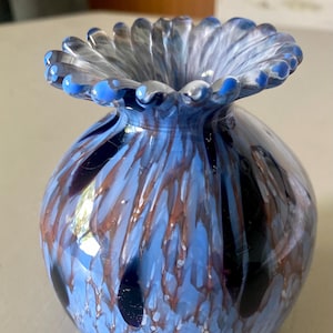 Vintage blue marbled glass bud vase with pretty scalloped rim