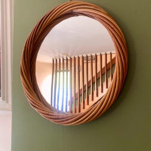 Vintage small round wicker wall mirror