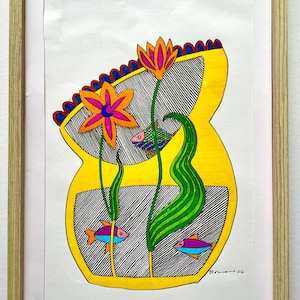May include: Colorful framed artwork featuring a yellow, abstract shape with black and white striped interior. The artwork includes orange and pink flowers, green leaves, and several fish with blue, purple, and orange hues. The frame is a light wood color.
