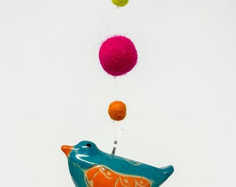 Hanging bird with three felt balls