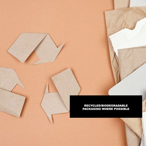 May include: Three brown paper arrows forming a recycling symbol on a light orange background. Text below the symbol reads "RECYCLED/BIODEGRADABLE PACKAGING WHERE POSSIBLE".