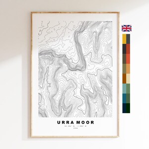 May include: A vertical rectangular wall art print featuring a black and white topographic contour map of Urra Moor. The text reads Urra Moor, 54.406 N, -1.084 W, 454m. To the right, a vertical color palette strip displays yellow, gray, red, tan, blue, and green.