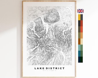 May include: Black and white topographic map print of the Lake District in England. The print features detailed contour lines and the text "LAKE DISTRICT" with coordinates.