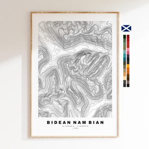 May include: A framed topographic map print of Bidean nam Bian featuring black contour lines on a white background. The text BIDEAN NAM BIAN, coordinates 56.642768 N, -5.029335 W, and 1150m are printed below the map. A small Scottish flag and color palette are visible.
