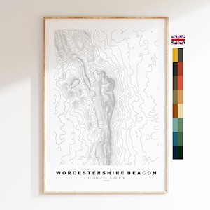 May include: A vertical wall art print featuring a black and white topographic map of Worcestershire Beacon. The print includes the text "WORCESTERSHIRE BEACON", coordinates, and an elevation of 425m. A vertical color palette strip is on the right.