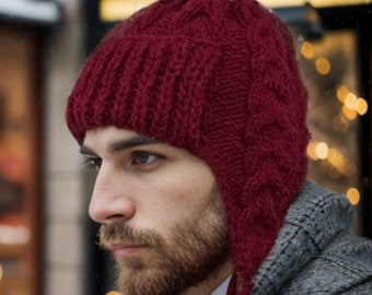 This handmade burgundy earflap hat with ties provides comfort and warmth to your head and ears.