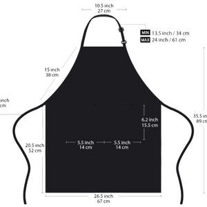 May include: Black apron with measurements in inches and centimeters. The apron has a neck strap and waist ties. The apron's dimensions are: 10.5 inches (27 cm) wide, 35.5 inches (89 cm) long, and the pocket is 6.2 inches (15.5 cm) wide.