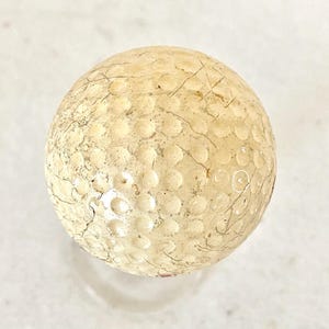 May include: A set of three ceramic mugs with a speckled, matte finish. The mugs are in shades of cream, light gray, and dark gray. Each mug has a simple, minimalist design, perfect for coffee or tea.