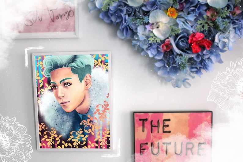 May include: A framed print of a man with teal hair, wearing a blue and white patterned shirt, against a background of colorful floral designs. The print is surrounded by a white frame.