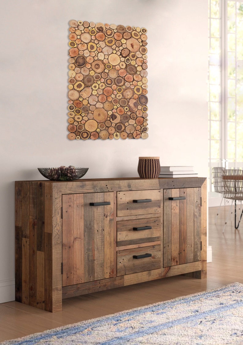 The image shows the wood slices wall art on a sideboard.