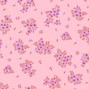 May include: Pink fabric with a repeating pattern of small purple flower clusters with red stems. The fabric is shown with a ruler for scale.