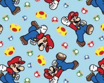 Half Yard - Super Mario and Mushroom Toss on Blue by Springs Creative - Nintendo Game Cotton Fabric FREESHIP90