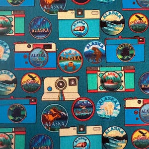 NEW! Half Yard - Destination: Alaska Take a Picture Teal by Benartex - Alaska Medallions Cameras USA Travel Vacation Cotton Sm Scale Fabric