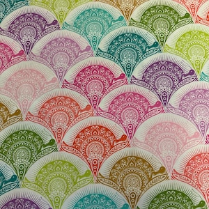 May include: A repeating pattern of stylized snails arranged in overlapping fan-shaped layers. Each snail features an intricate mandala-like shell design in vibrant colors including lime green, teal, magenta, orange, purple, and soft pink.