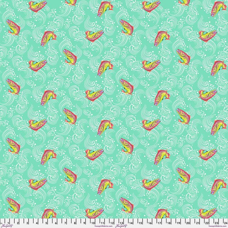 May include: A turquoise blue fabric with a white repeating pattern of stylized fish swimming in waves. The fish are pink and yellow.