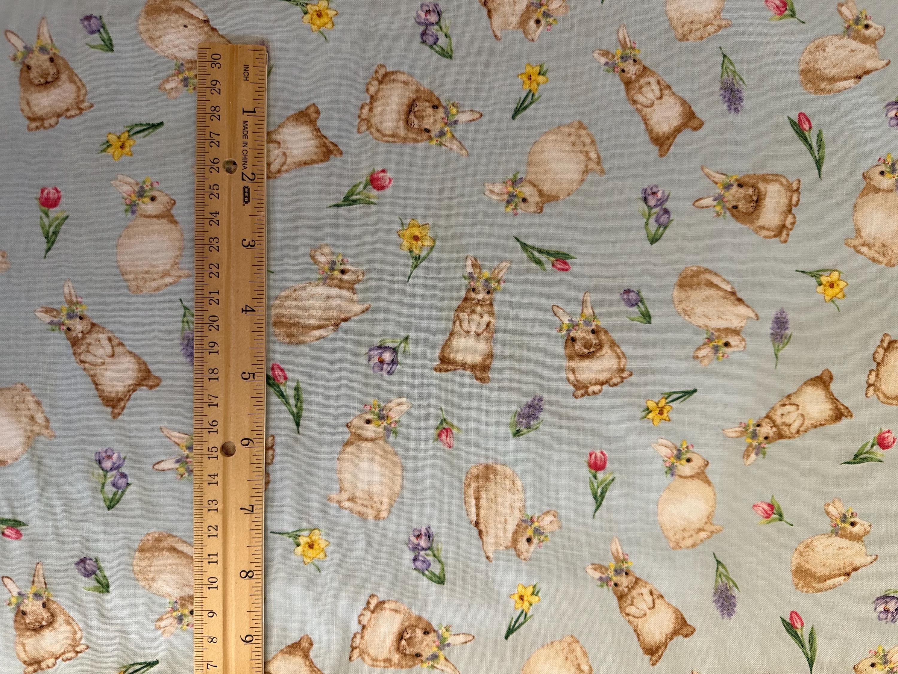 Half Yard - Hoppy Hunting Easter Bunnies on Blue by Henry Glass