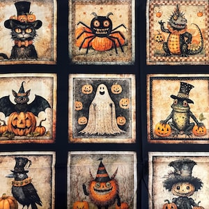 May include: A black fabric panel featuring a grid of nine square illustrations with Halloween themes. The images depict a cat in a top hat, a spider on pumpkins, a lizard, a bat on a pumpkin, a ghost, a frog in a top hat, a crow, a monster, and a pumpkin-headed figure.