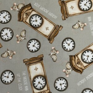 May include: A gray fabric featuring a repeating pattern of brown grandfather clocks and small light brown mice. The text HICKORY DICKORY DOCK and THE MOUSE RAN UP THE CLOCK is printed in white across the surface alongside round wall clocks.