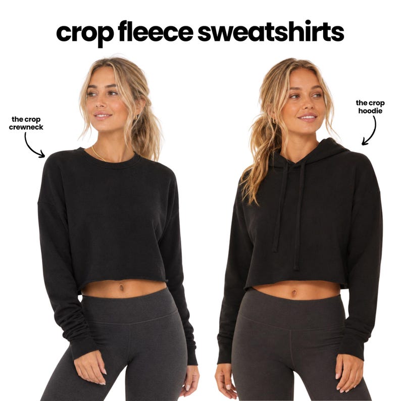 two women wearing black crop fleece sweatshirts, one with a crew neck and the other with a hoodie.