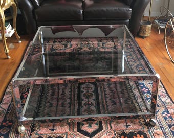 Vintage Mid Century Modern Chrome And Smoked Glass Two-tier Coffee Table With Casters 1970s Willy Rizzo, Maison Jansen era
