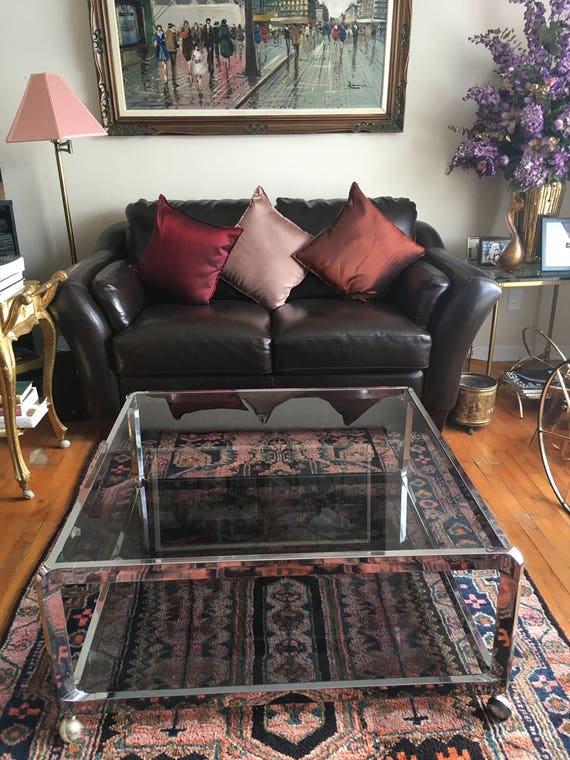 Glass two 2024 tier coffee table