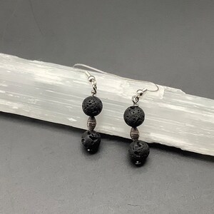 Lave stone between silver spacer earrings