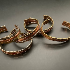 Brass, copper, steel cuffs