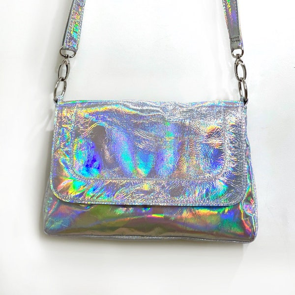 Holographic Silver Messenger bag, magnet flap close, Lining options, zipper pockets, premium Italian holo leather, removable adjust. strap