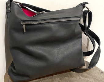 Matte black leather crossbody bag, rustic smooth soft leather, lining options, zipper pocket, premium soft leather, adjustable strap