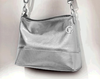Metallic Silver leather bag, stud embossed leather, adjustable Crossbody, easy slide zippers, lining options, slip and zip pockets