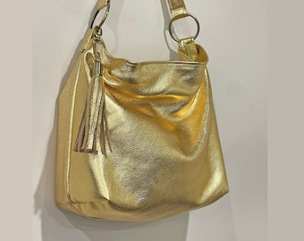 Metallic gold crossbody bag, lining options, zipper pockets, premium soft metallic leather, removable adjustable strap, gold leather