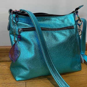 Metallic turquoise crossbody bag, lined bag, zipper pockets, slip pockets, premium soft metallic leather, hobo bag, hardware options