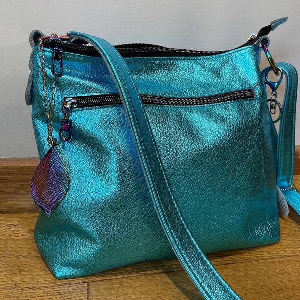 Metallic turquoise crossbody bag, lined bag, zipper pockets, slip pockets, premium soft metallic leather, hobo bag, hardware options