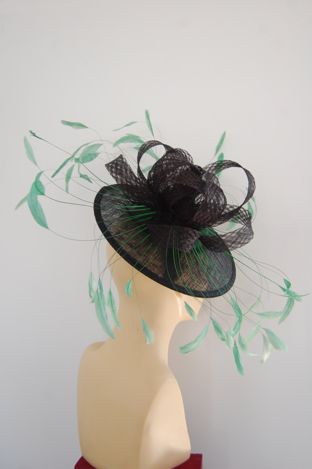 Black & Emerald green saucer hatinator by Hats2go
