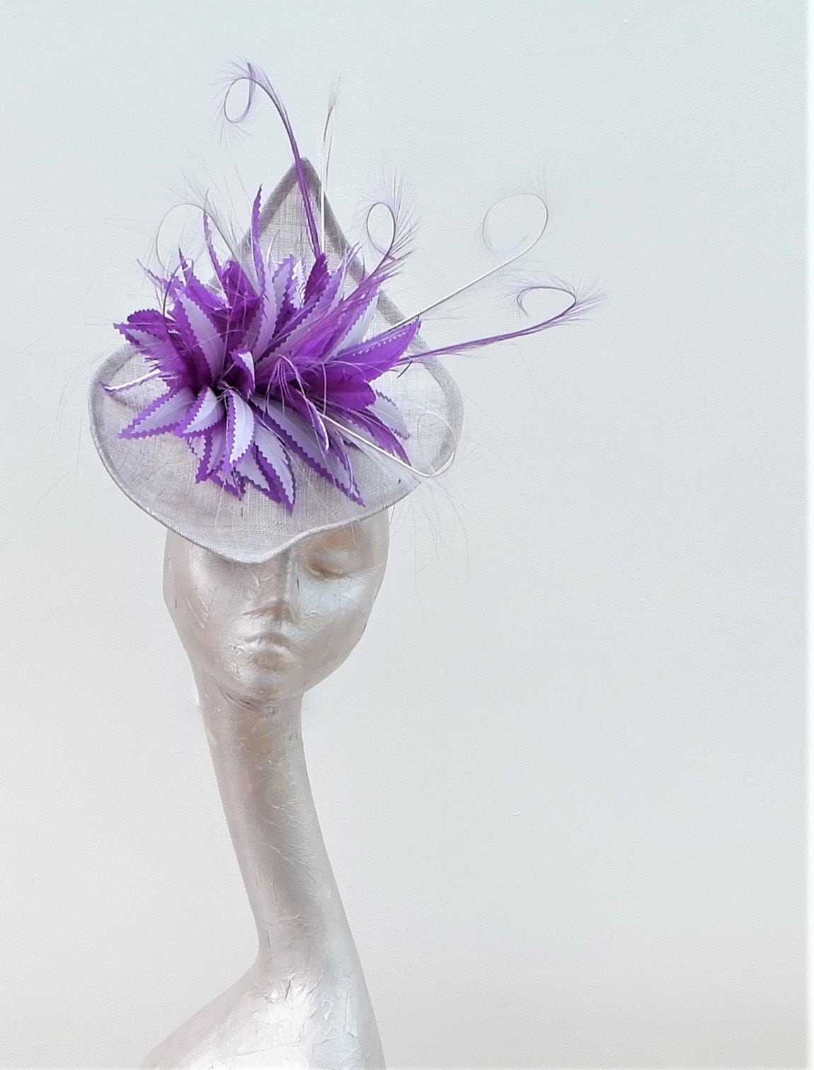 Irregular Shaped Silver hatinator with 