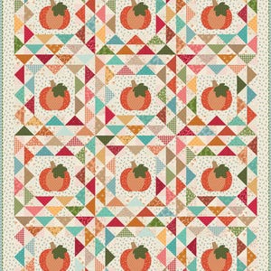 May include: A patchwork quilt featuring orange pumpkins with green stems, set against a background of colorful triangles. The quilt's design incorporates various patterns and colors, including red, teal, and beige, creating a cozy, autumnal theme.