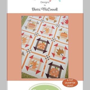 May include: A quilt pattern by Sherri McConnell, titled "Fall Dash." The quilt design features pumpkin and leaf motifs in orange, brown, and white. The pattern is for a fat quarter quilt. The text "a Quilting Life" is at the top.