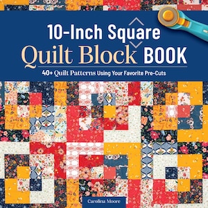 May include: A book titled "10-Inch Square Quilt Block BOOK" with a colourful quilt block pattern on the cover. The cover also features a rotary cutter and the text "40+ Quilt Patterns Using Your Favorite Pre-Cuts."