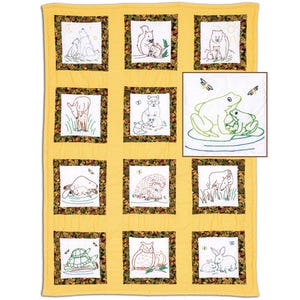 May include: A yellow quilt with embroidered squares featuring woodland animals. Each square has a different animal family, such as bears, squirrels, and rabbits. The quilt has a leaf pattern border and is a cozy, handmade item.